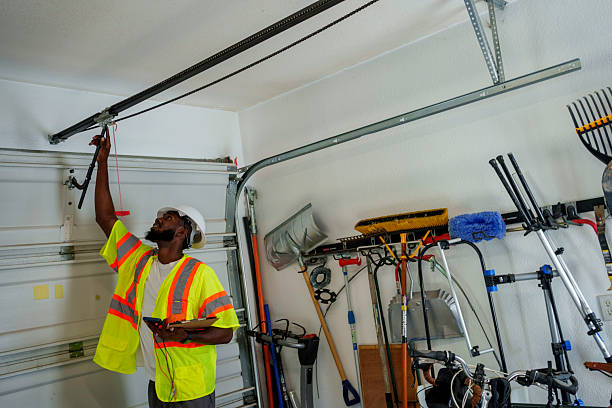 Professional Garage Door Panel Replacement technician working in St. John, KS