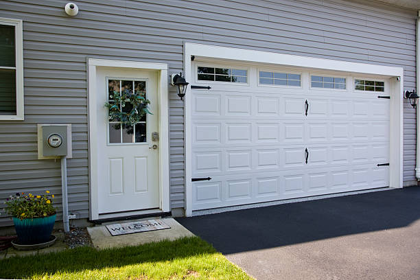 24/7 Emergency Garage Door Panel Replacement experts in St. John, KS